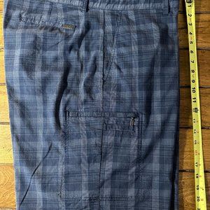 Greg Norman plaid shorts